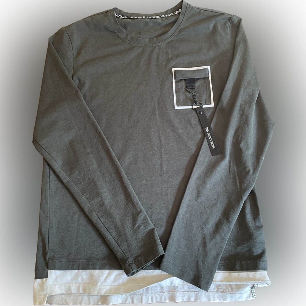 Hunter green MCM LXXX VII running shirt. 52.8% cotton 43.9% nylon 3.3% spandex